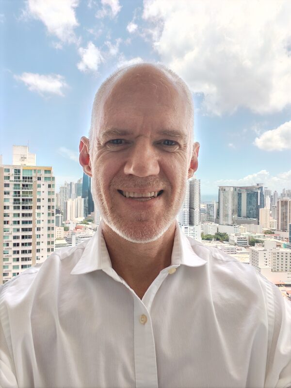 Headshot of Adrian Scott